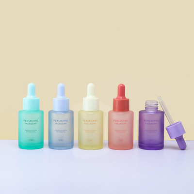El dropper de cristal de empaquetado helado del aceite esencial del suero del cosmético de cristal colorido de la botella embotella 30ml
