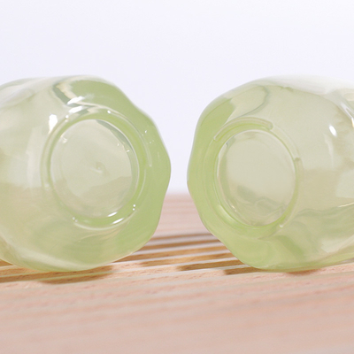 Botellas de aguacate verde transparente de 30 ml de vidrio de base líquida para el envase de cuidado de la piel