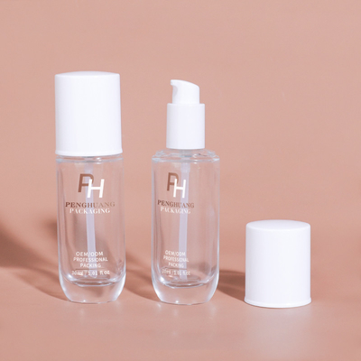 Botella de base de líquido vacío de forma redonda 30 ml 1 oz botella de bomba de loción de vidrio para envases cosméticos