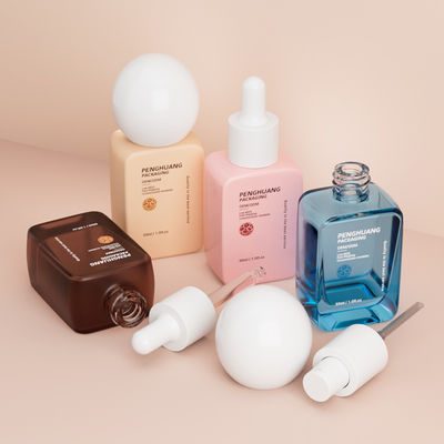 Botellas de bomba al por mayor vacías de 30 ml de tapa de bola redonda de vidrio cuadrado botellas de base líquida de vidrio