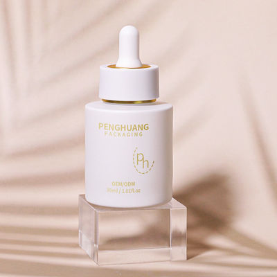 Botellas de goteador de suero de vidrio transparente para requisitos personalizados de cuidado de la piel