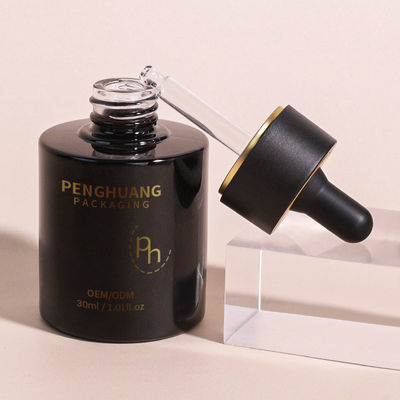 Botellas de goteador de suero de vidrio transparente para requisitos personalizados de cuidado de la piel