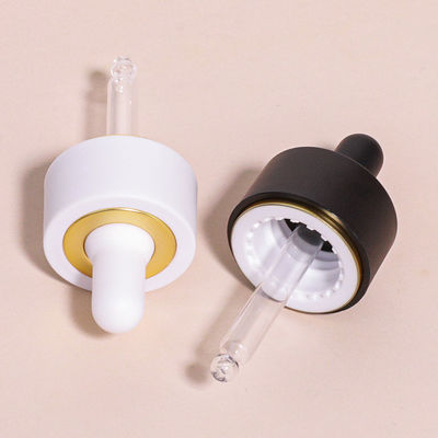 Botella cuentagotas redonda de vidrio con logotipo personalizado según los requisitos del cliente