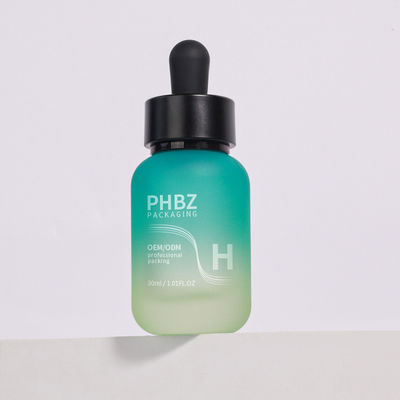Según los requisitos del cliente, botellas cuentagotas de suero de 30 ml, botella cuentagotas redonda de vidrio mate, tipo de tapa duradera y opción de embalaje