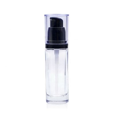 Cosméticos de lujo de la ronda 30ml que empaquetan la botella líquida de cristal de la fundación con la bomba de la belleza