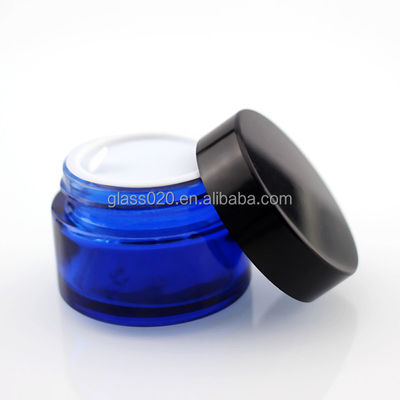 Tarros de cristal de la crema azul vacía 30g de lujo para el cosmético con la tapa
