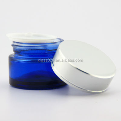 Tarros de cristal de la crema azul vacía 30g de lujo para el cosmético con la tapa