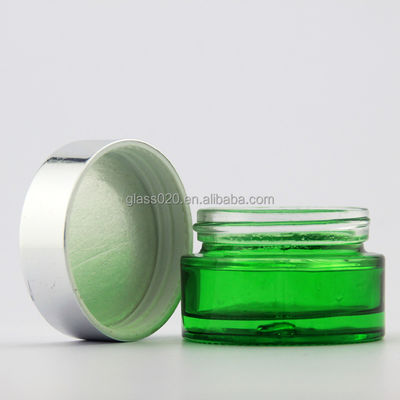 El vidrio poner crema verde vacío sacude 5g-100g con la tapa de plata para el cosmético
