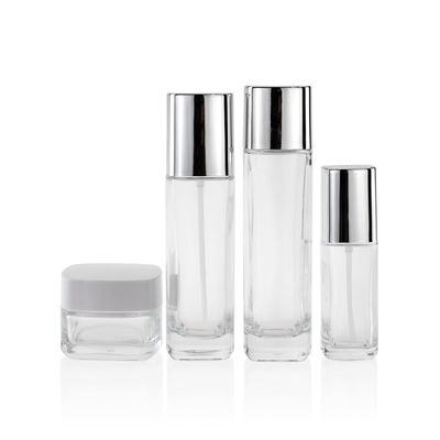 Los envases cosméticos vacíos del vidrio 50ml 100ml 120ml bombean el casquillo y el tapón de tuerca del espray