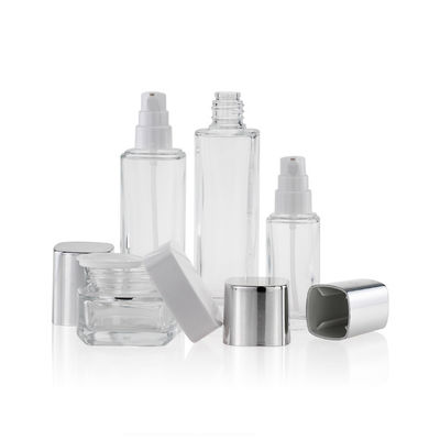 Los envases cosméticos vacíos del vidrio 50ml 100ml 120ml bombean el casquillo y el tapón de tuerca del espray