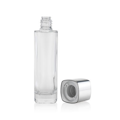 Los envases cosméticos vacíos del vidrio 50ml 100ml 120ml bombean el casquillo y el tapón de tuerca del espray