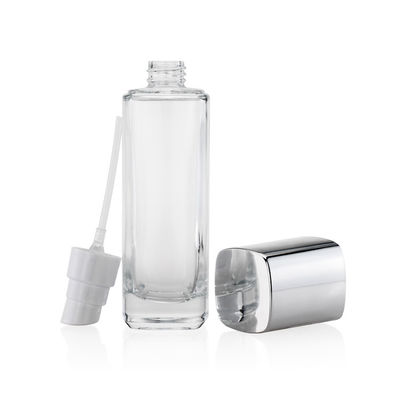 Los envases cosméticos vacíos del vidrio 50ml 100ml 120ml bombean el casquillo y el tapón de tuerca del espray