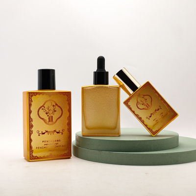 Botella de cristal modificada para requisitos particulares del dropper del aceite esencial del aceite 30ml 50ml 100ml del oro del suero de lujo vacío cosmético del cuadrado