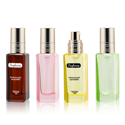 El vidrio de oro de la loción de la bomba embotella el verde rosado azul Amber Semi Color Transparent 30ml