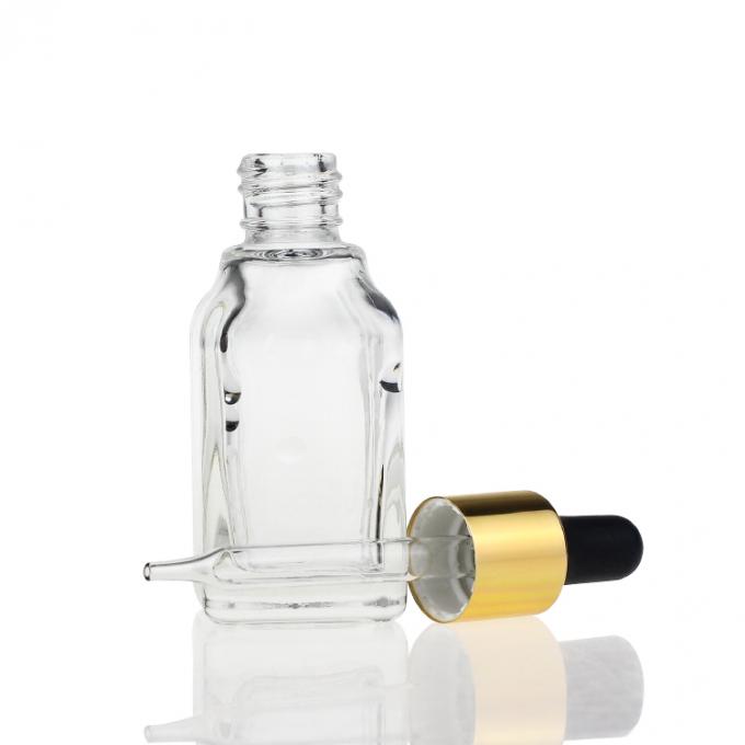 Botella de cristal de lujo de empaquetado cosmética clara 35ml del suero del nuevo diseño con el dropper