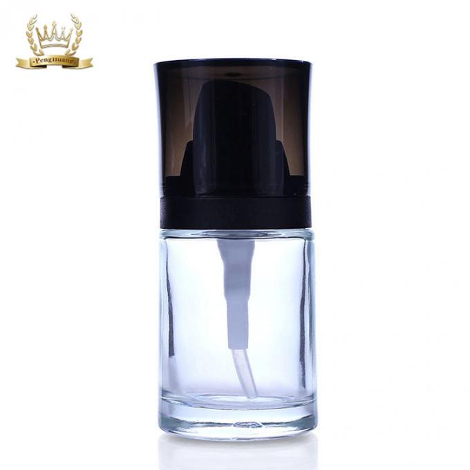 Botella de empaquetado cosmética de la fundación de la cara 30ml del vidrio claro de alta calidad con la bomba