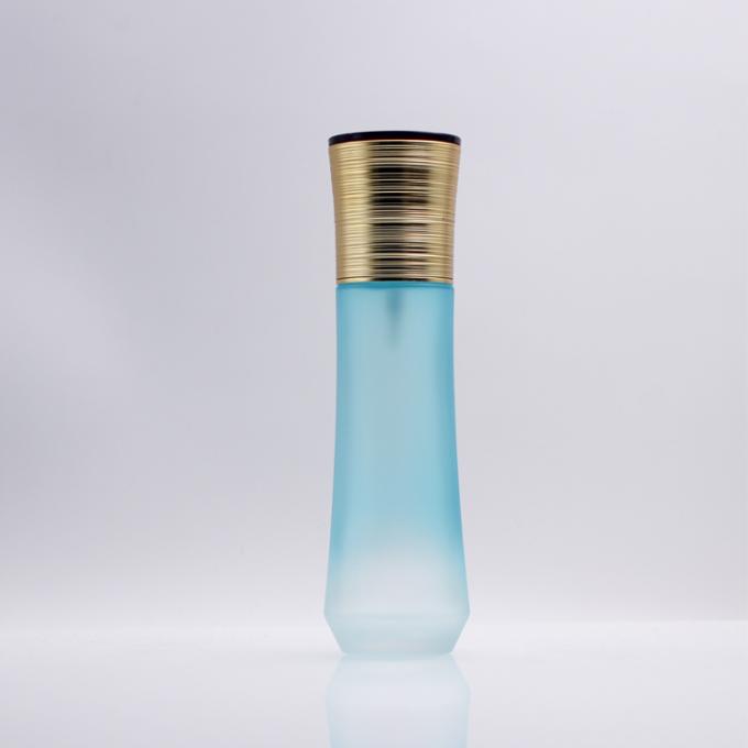 Botellas cosméticas de cristal vacías azules de pintura de la loción 100ml de la bomba con la venta al por mayor del casquillo del oro para el cuidado de piel